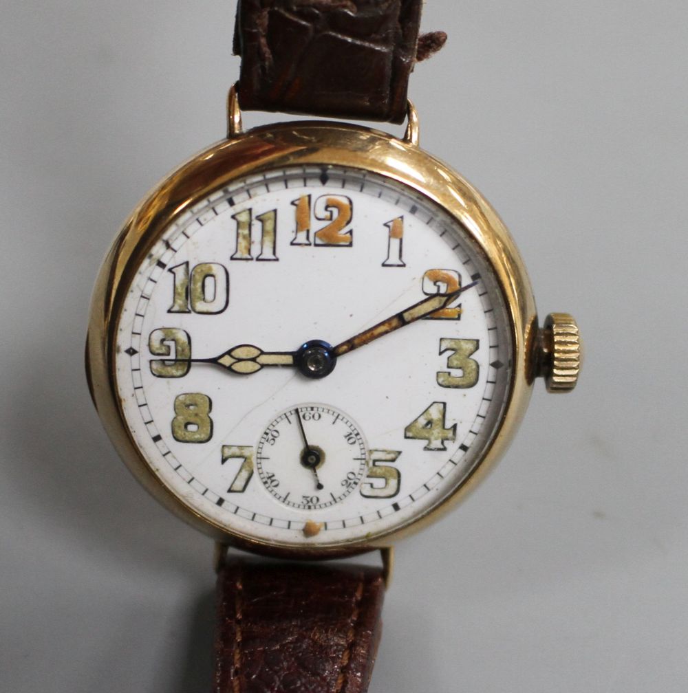 A gentlemans 1920s 9ct. gold manual wind wristwatch, with case back inscription.